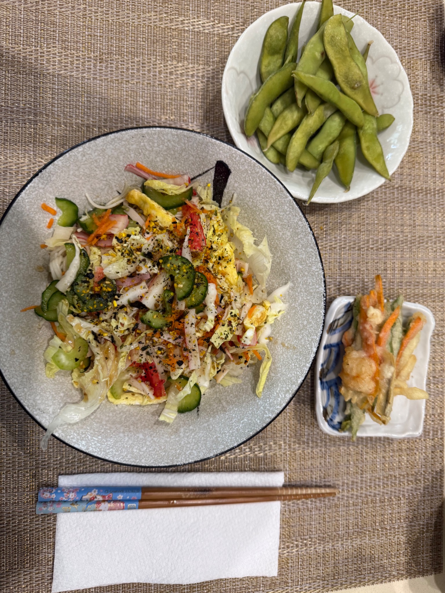 Colorful plated salad with edamame and vegetable tempura